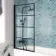 Oakham 1700 Space Saving Shower Bath & 6mm Easy Clean Matt Black Grid Bath Screen - Left Handed