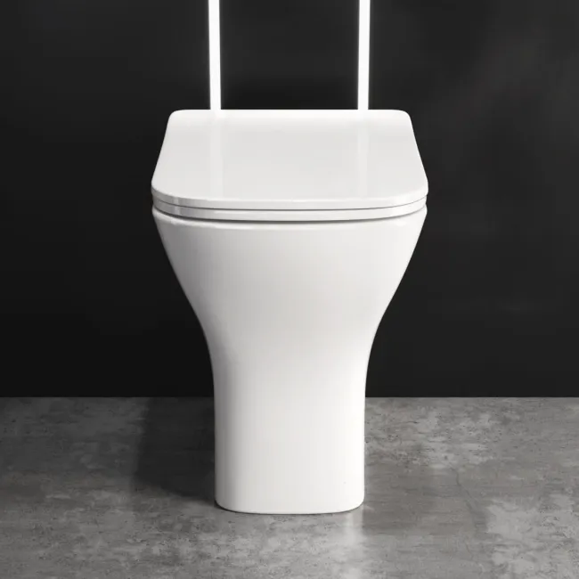 Atlanta Rimless Comfort Height Back To Wall Toilet With Premium Soft Close Slim Seat
