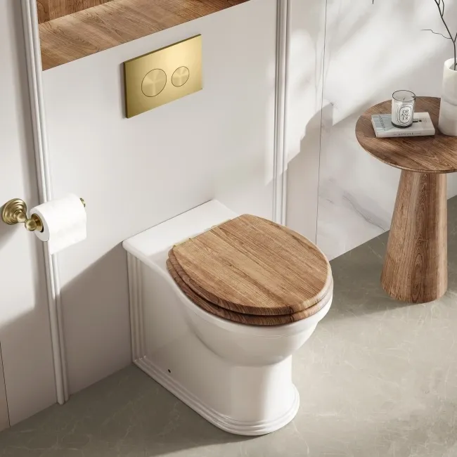 Alma Traditional Rimless Back To Wall Toilet With Oak Effect Wooden Soft Close Seat - Brushed Brass Hinges